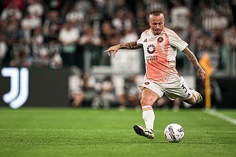 Serie A 2024-25 Juventus vs Roma: Roma's Angelino shoots the ball